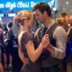 Couple slow dancing at a high school reunion